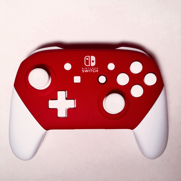 Red and White Nintendo Switch Pro Controller